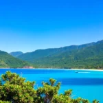Best tropical island scenery in Lombok with stunning beaches and lush mountains for travel enthusiasts.